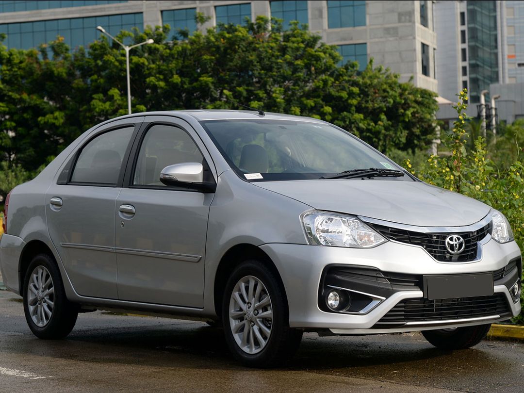 Yellow Toyota Etios Sedan Taxi